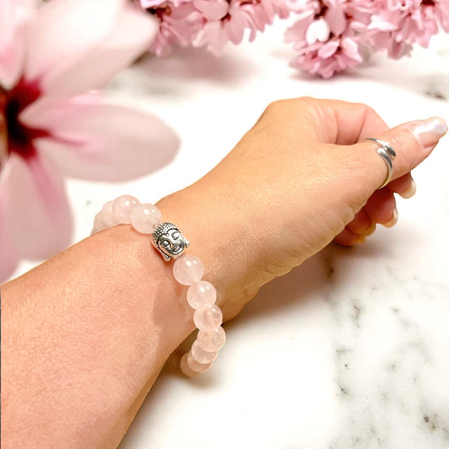 Echtes Rosenquarz Perlenarmband 8mm mit versilberter Edelstahl Buddha Perle - handgefertigt - Madagaskar