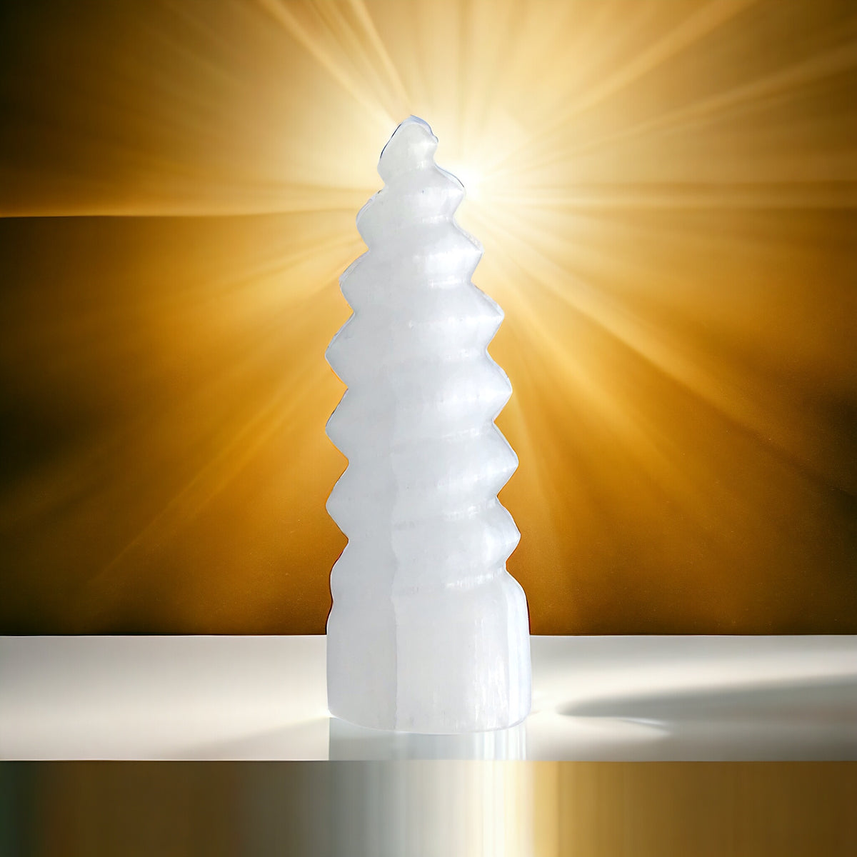 Selenit Kristallflamme in Spiralform 14 cm hoch, ca. 350gr. I Handarbeit I geschnitzt und poliert I Marokko