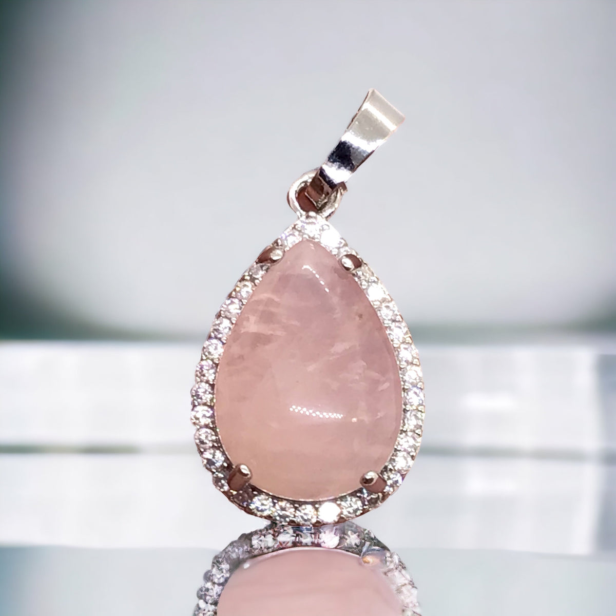 Steinfixx® -  Royale Edelstein Anhänger in Tropfenform, umrahmt von Zirkonia, Edelstahl versilbert