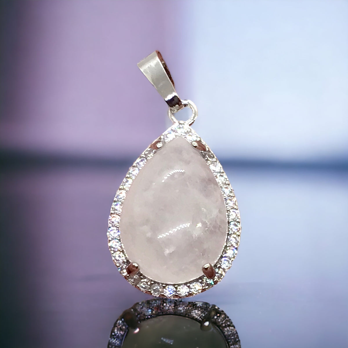 Steinfixx® -  Royale Edelstein Anhänger in Tropfenform, umrahmt von Zirkonia, Edelstahl versilbert