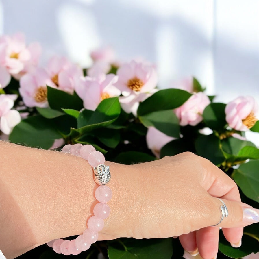 Echtes Rosenquarz Perlenarmband 8mm mit versilberter Edelstahl Buddha Perle - handgefertigt - Madagaskar
